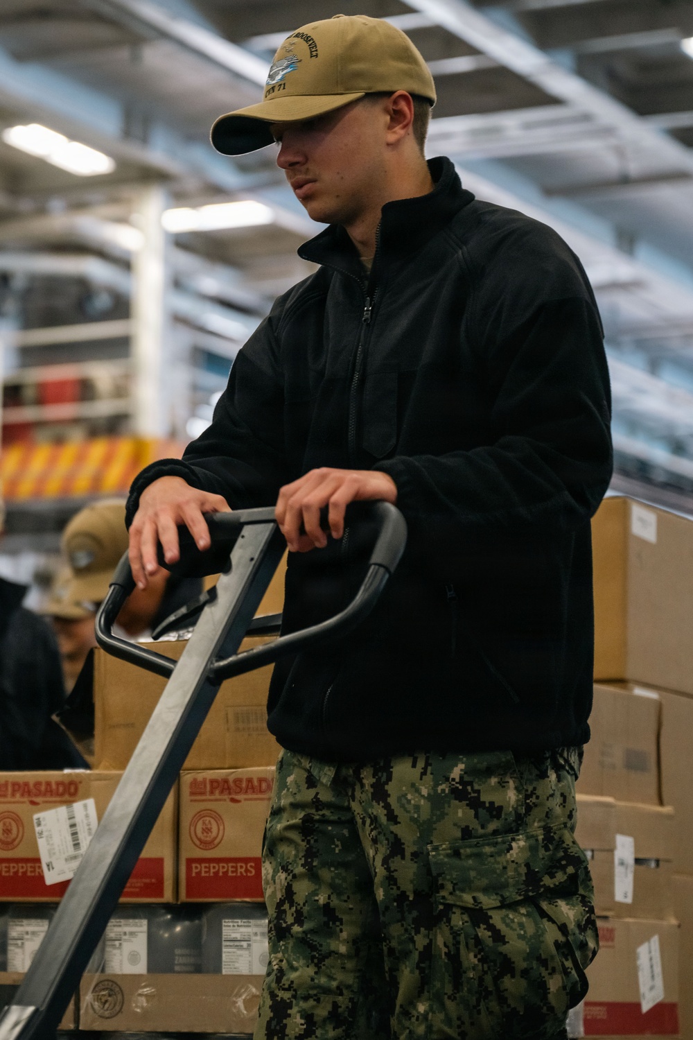 U.S. Navy Sailors Move Supplies