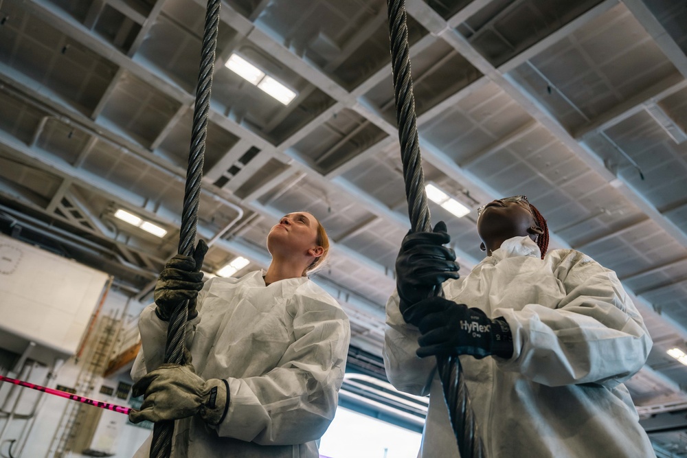 U.S. Navy Sailors Conduct Maintenance