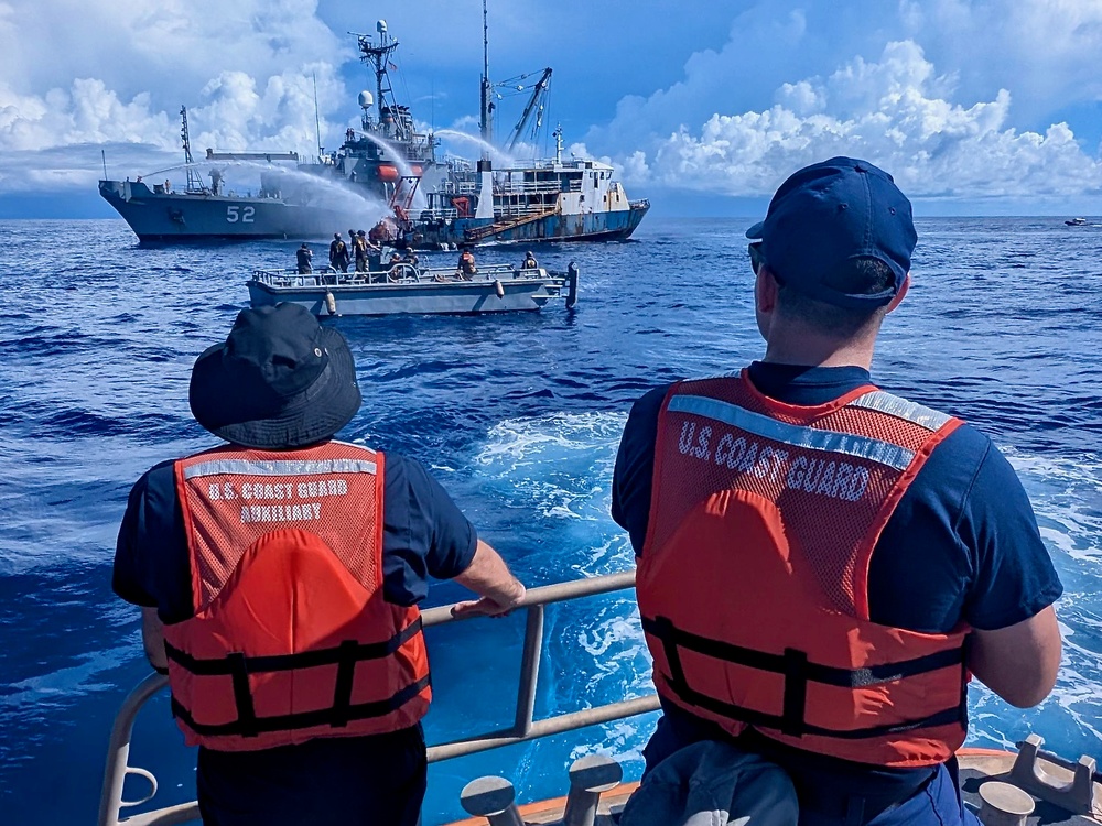 U.S. Coast Guard, U.S. Navy, Port of Guam responders see motor vessel Voyager safely removed
