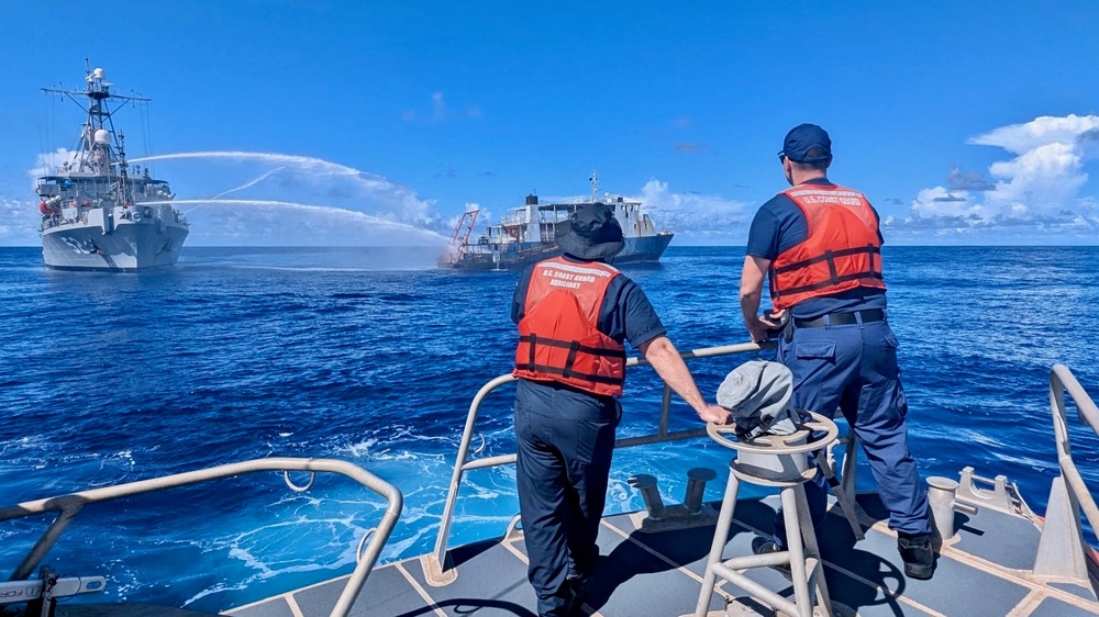 U.S. Coast Guard, U.S. Navy, Port of Guam responders see motor vessel Voyager safely removed