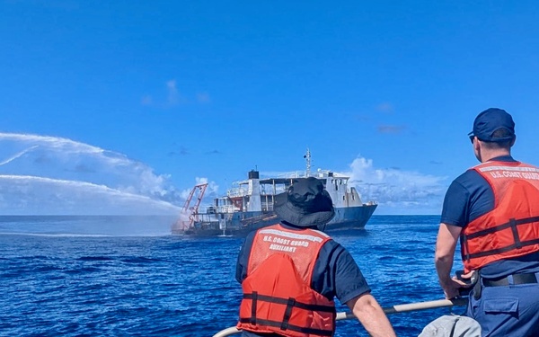 U.S. Coast Guard, U.S. Navy, Port of Guam responders see motor vessel Voyager safely removed