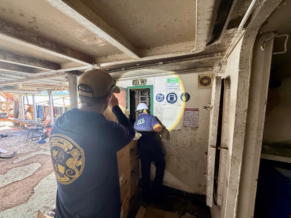 U.S. Coast Guard, U.S. Navy, Port of Guam responders ensure debris removed from motor vessel Voyager