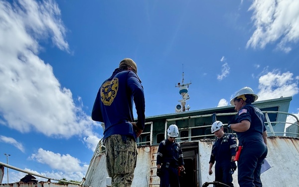 U.S. Coast Guard, U.S. Navy, Port of Guam responders ensure debris removed from motor vessel Voyager