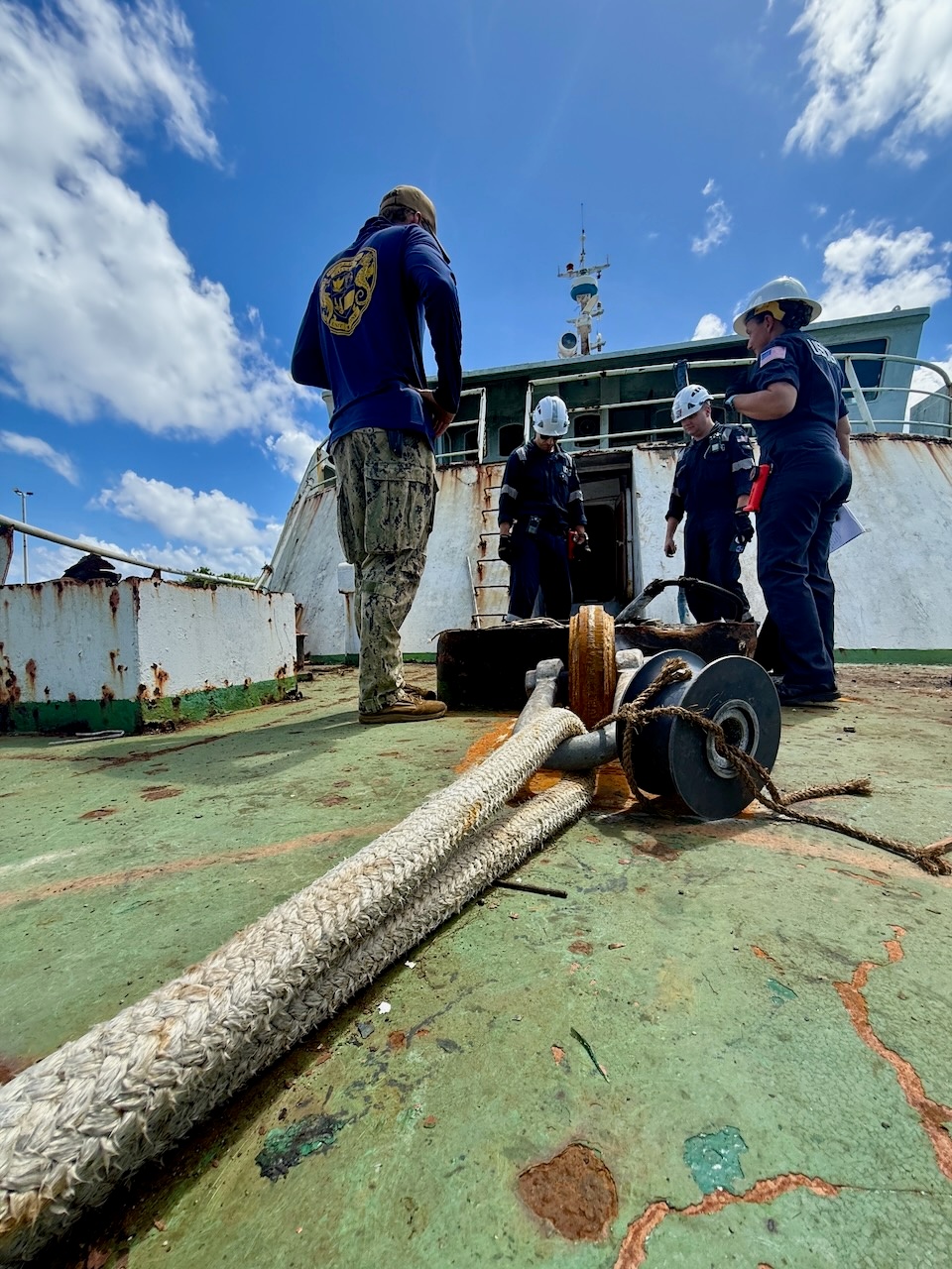 U.S. Coast Guard, U.S. Navy, Port of Guam responders ensure debris removed from motor vessel Voyager