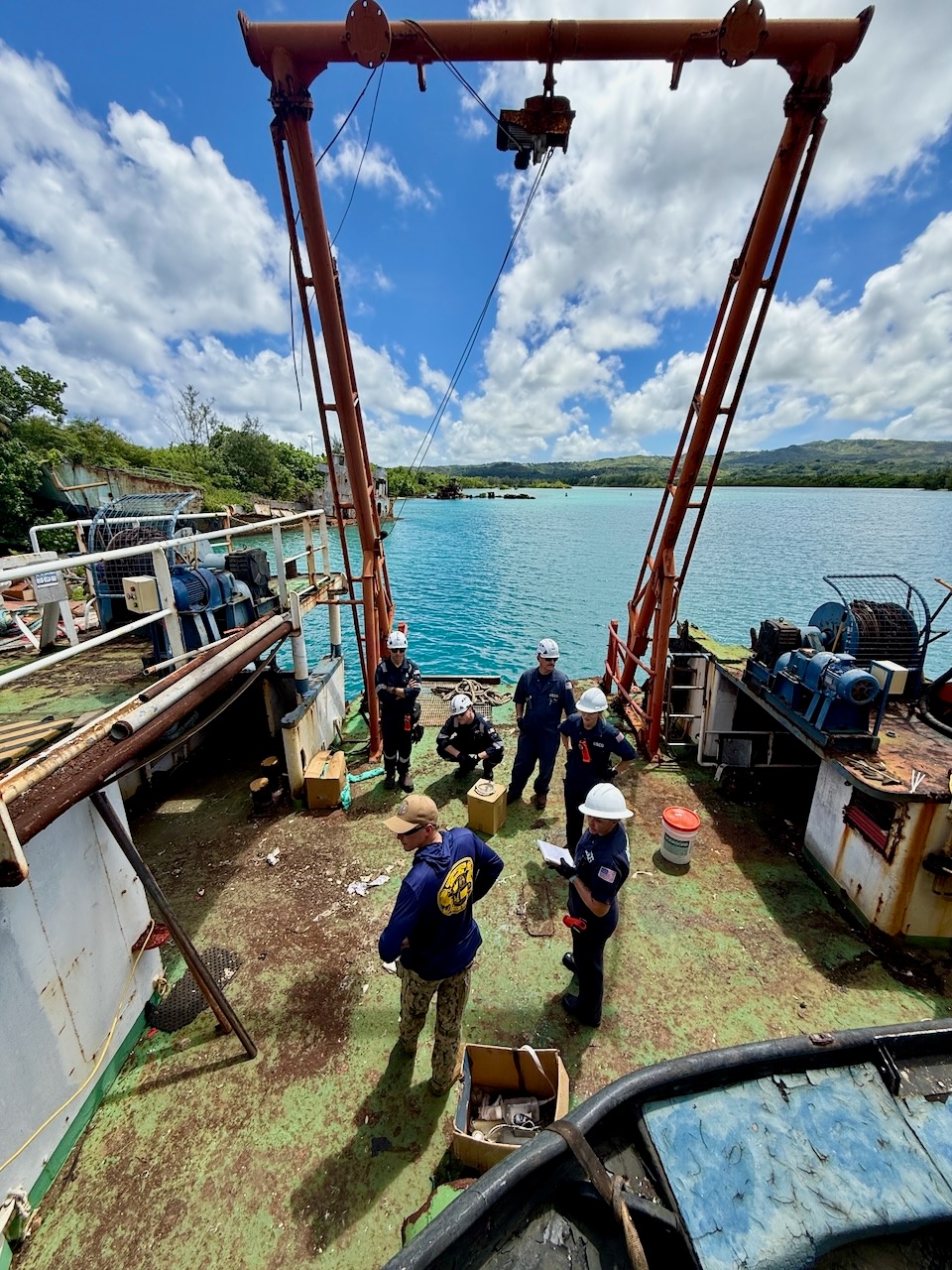 U.S. Coast Guard, U.S. Navy, Port of Guam responders ensure debris removed from motor vessel Voyager