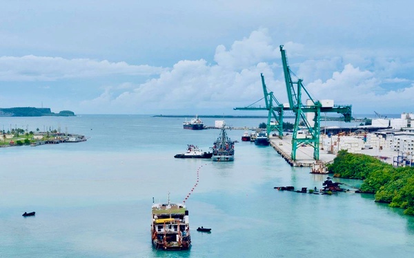U.S. Navy, U.S. Coast Guard, Port of Guam refloat motor vessel Voyager