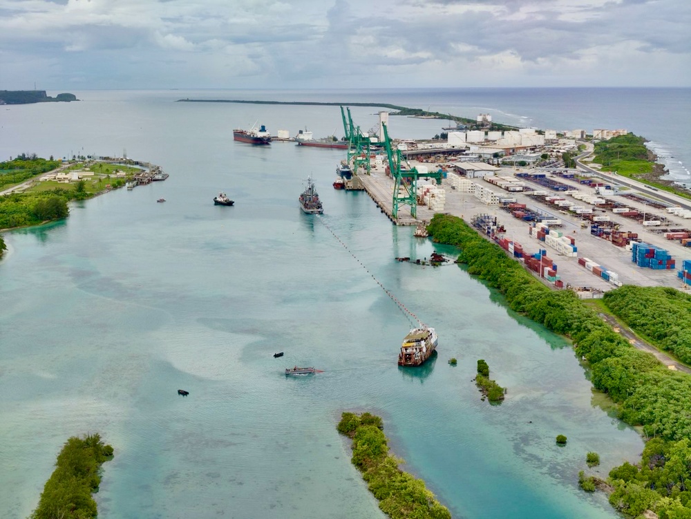 U.S. Navy, U.S. Coast Guard, Port of Guam refloat motor vessel Voyager