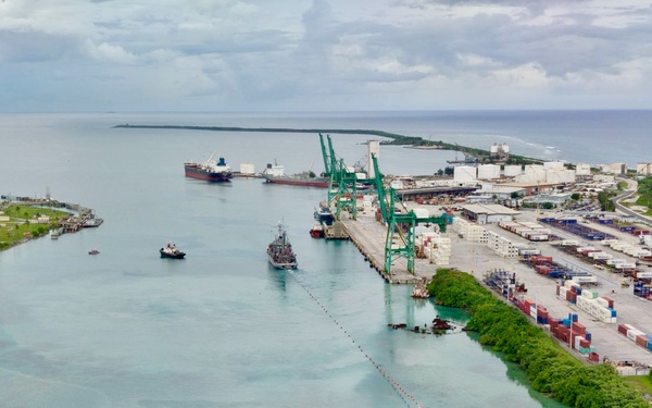 U.S. Navy, U.S. Coast Guard, Port of Guam refloat motor vessel Voyager