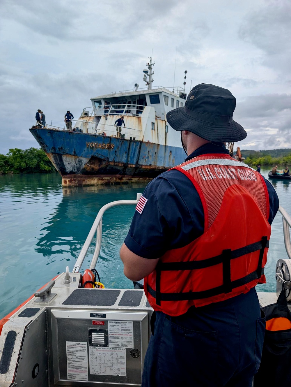 U.S. Navy, U.S. Coast Guard, Port of Guam refloat motor vessel Voyager