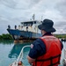U.S. Navy, U.S. Coast Guard, Port of Guam refloat motor vessel Voyager