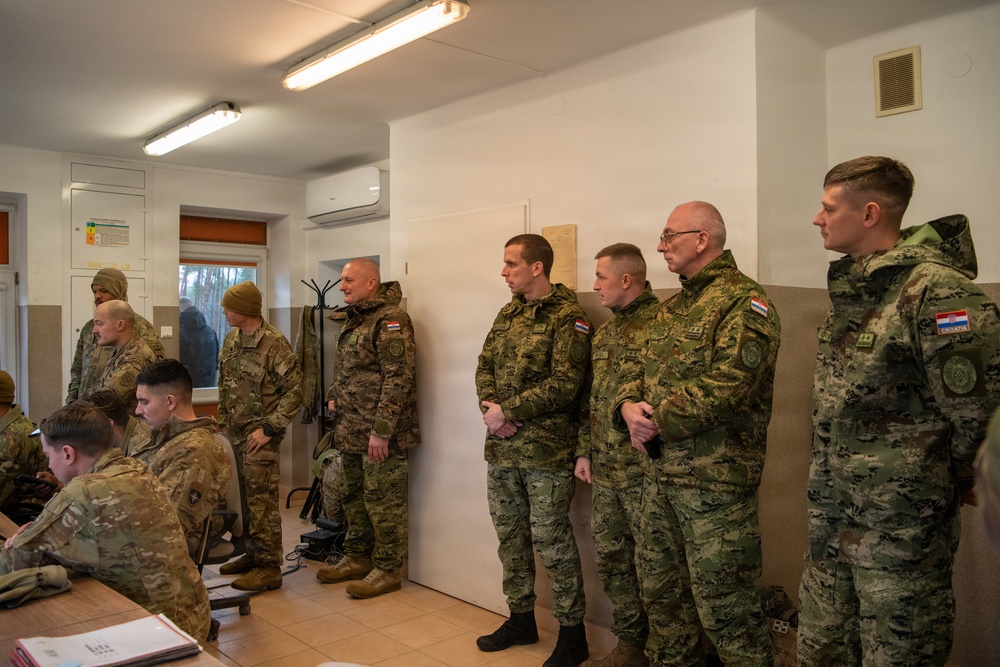 NATO and local officials observe U.S. Abrams gunnery at BPTA