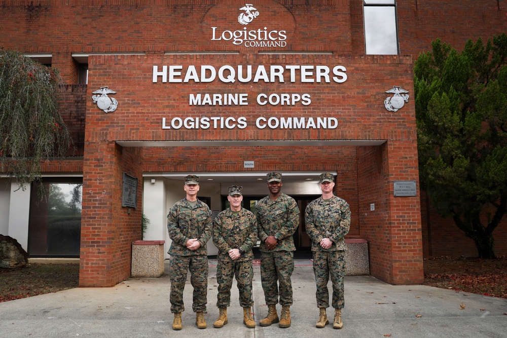 Brigadier General Ralph J. Rizzo, Jr., Commanding General, Marine Corps Installations East and Sergeant Major Wesley O. Turner II, Command Senior Enlisted Leader, Marine Corps Installations East visit LOGCOM HQ.