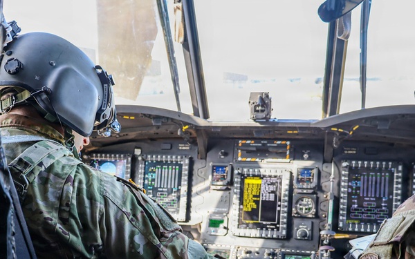 82nd Airborne CH-47 Chinook Aircrew Prepare to Conduct Combined Arms Field Exercise with SOF Civil Affairs