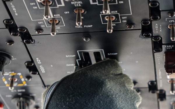 82nd Airborne CH-47 Chinook Pilot Checks Equipment Prior to a Combined Arms Field Exercise with SOF Civil Affairs