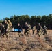 SOF Civil Affairs Soldiers Carry a Simulated Combat Casualty for Evacuation in a Recent Combined Arms Field Exercise with a 82nd Airborne CH-47 Chinook Crew
