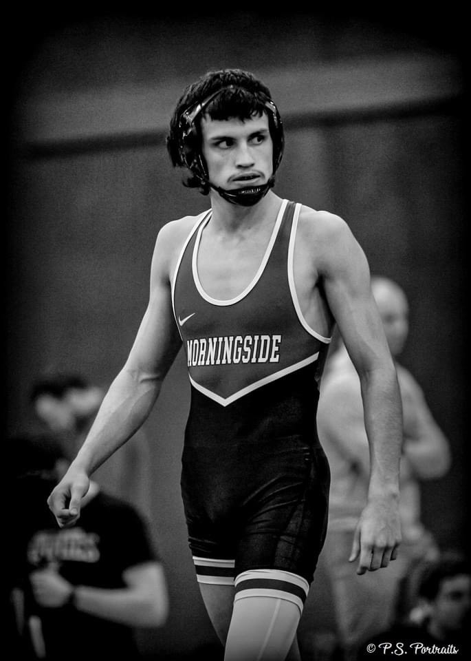 Airman wrestles toward opportunity, Air Force opens door to the mat