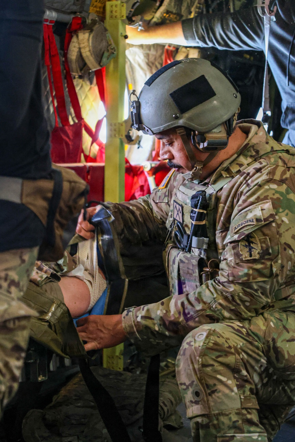SOF Civil Affairs Soldier Conducts Critical Combat Casualty Care in a Recent Combined Arms Field Exercise with a 82nd Airborne CH-47 Chinook Crew
