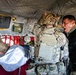 Medical Officer Guides SOF Civil Affairs Soldier Conducting Critical Combat Casualty Care in a Recent Combined Arms Field Exercise with a 82nd Airborne CH-47 Chinook Crew