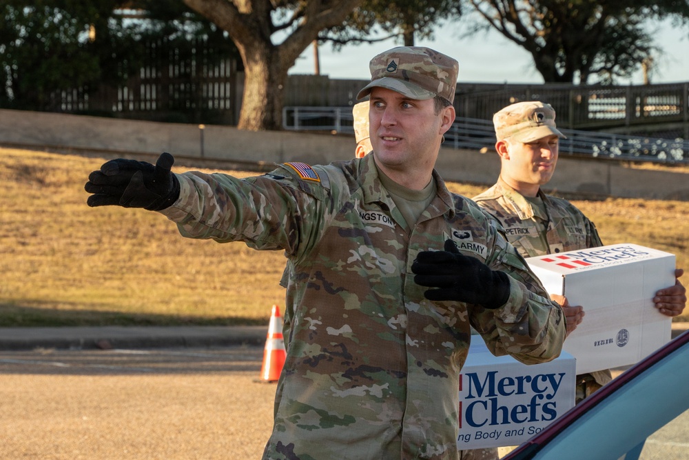 Troopers and Mercy Chefs deliver holiday cheer