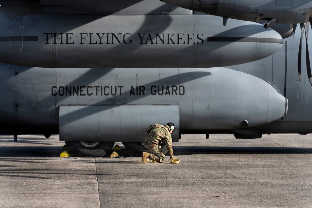 Crew Chief statically grounds a C-130 Hercules