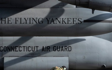 Crew Chief statically grounds a C-130 Hercules