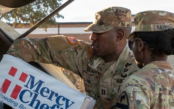 Troopers and Mercy Chefs deliver holiday cheer