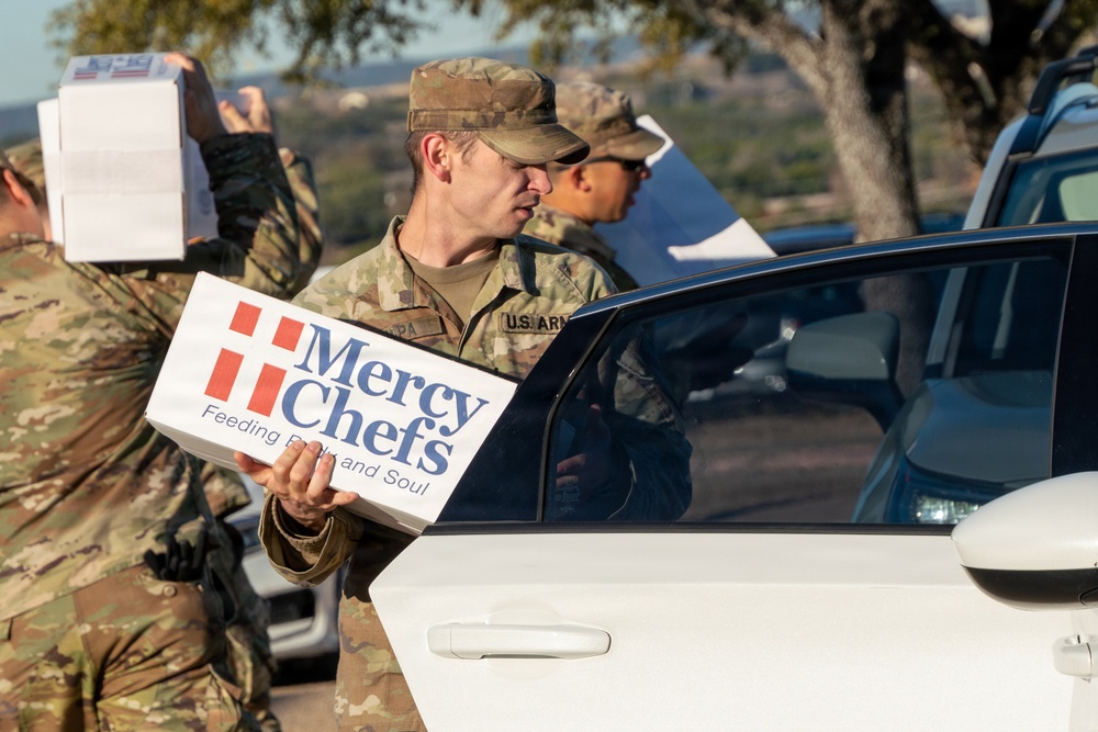 Troopers and Mercy Chefs deliver holiday cheer