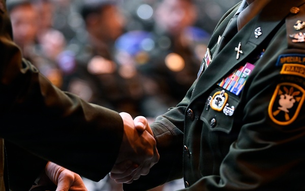 Special Forces Students Don Green Berets at Regimental First Formation