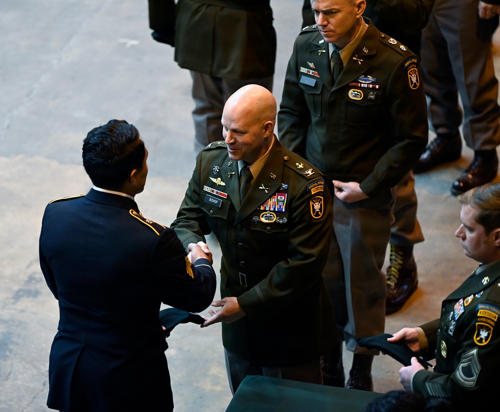 Special Forces Students Don Green Berets at Regimental First Formation