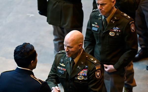 Special Forces Students Don Green Berets at Regimental First Formation