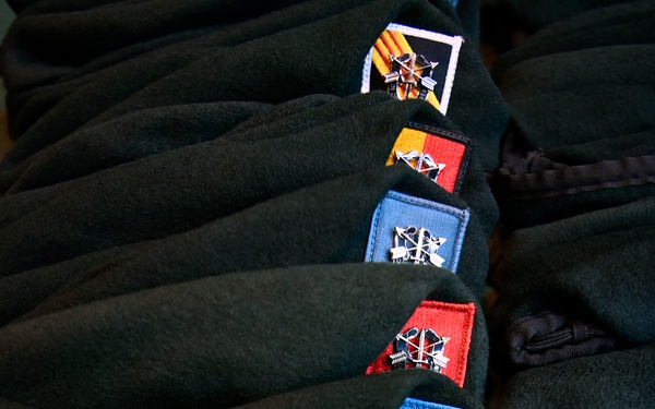 Special Forces Students Don Green Berets at Regimental First Formation