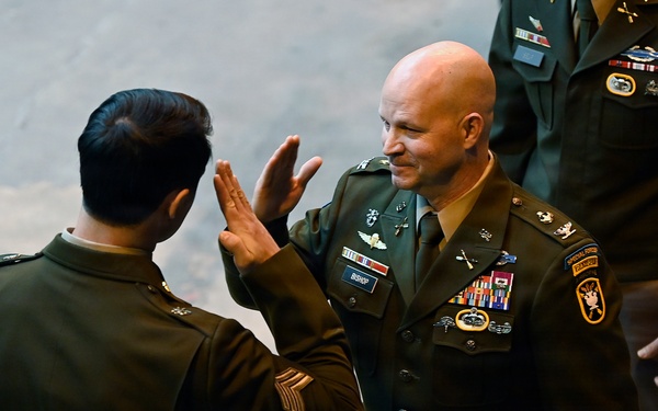 Special Forces Students Don Green Berets at Regimental First Formation