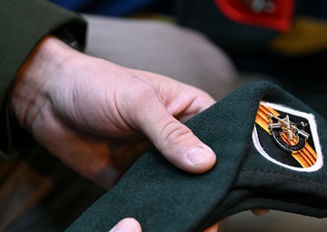 Special Forces Students Don Green Berets at Regimental First Formation