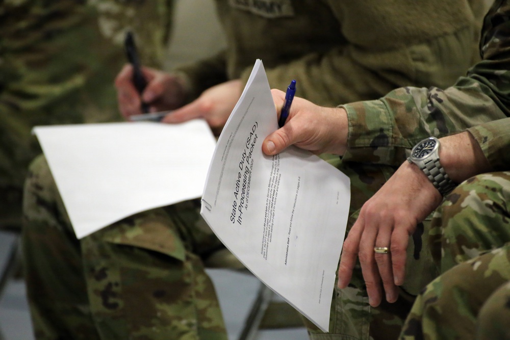 Washington National Guard members prepare to support flood relief efforts
