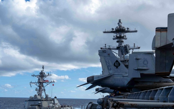 Abraham Lincoln conducts a fueling-at-sea with Frank E. Petersen Jr.