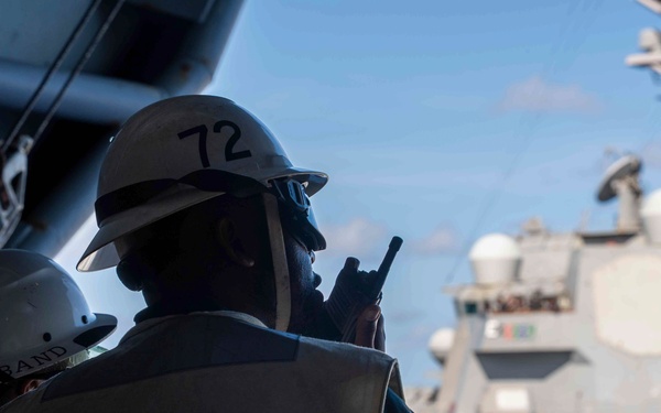 Abraham Lincoln conducts a fueling-at-sea with Frank E. Petersen Jr.