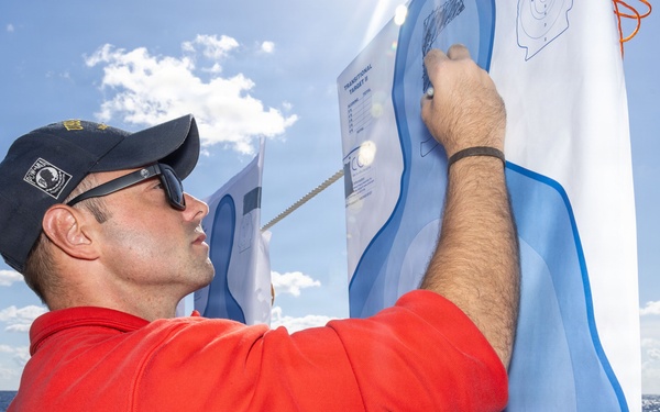 USS Milius (DDG 69) conducts small arms gun shoot