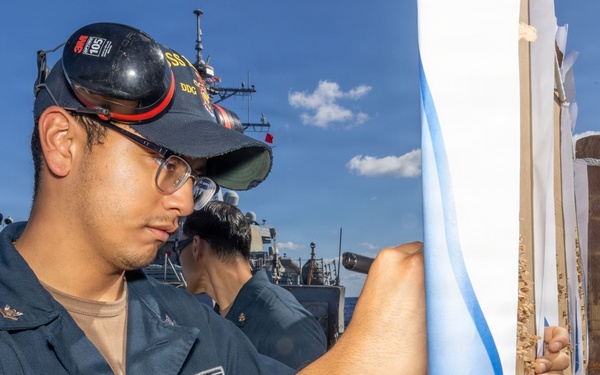 USS Milius (DDG 69) conducts small arms gun shoot