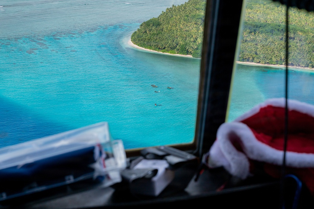 374 AEW Airmen bring holiday drops to islanders