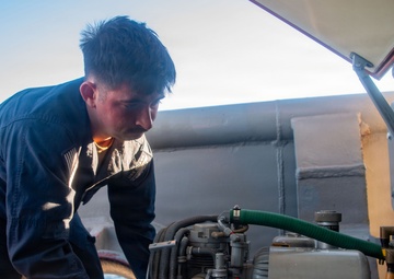 USS Boxer Fire Controlman conducts CIWS maintenance