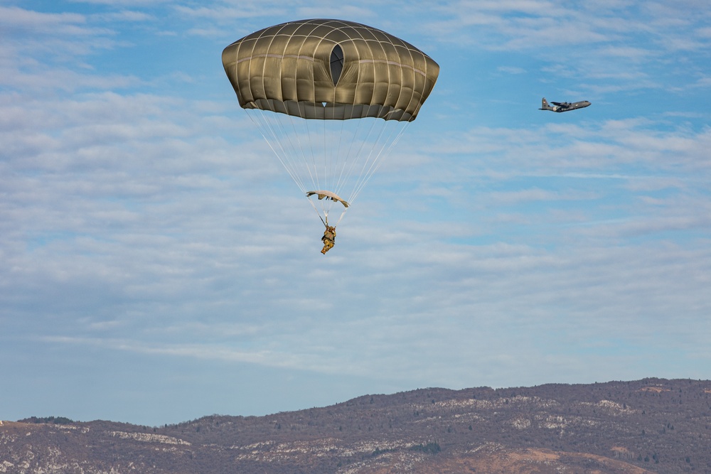 U.S. and Allied paratroopers conduct multinational holiday jump in Italy.