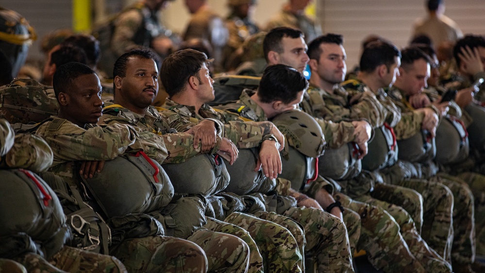 U.S. and Allied paratroopers conduct multinational holiday jump in Italy.