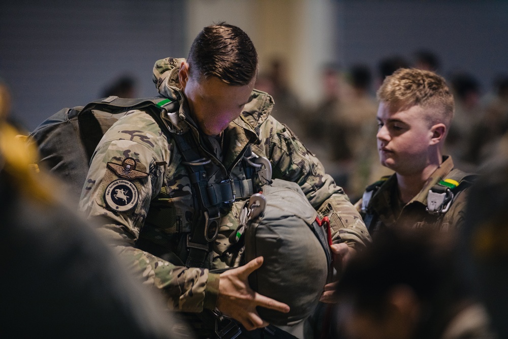 U.S. and Allied paratroopers conduct multinational holiday jump in Italy.