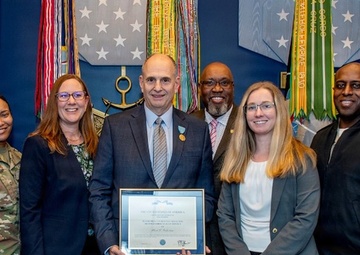 ‘Deep sense of service’ drives public health expert to protect warfighters, recognized by Department of War