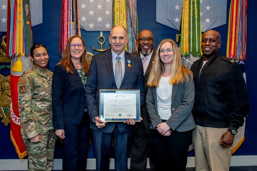 ‘Deep sense of service’ drives public health expert to protect warfighters, recognized by Department of War