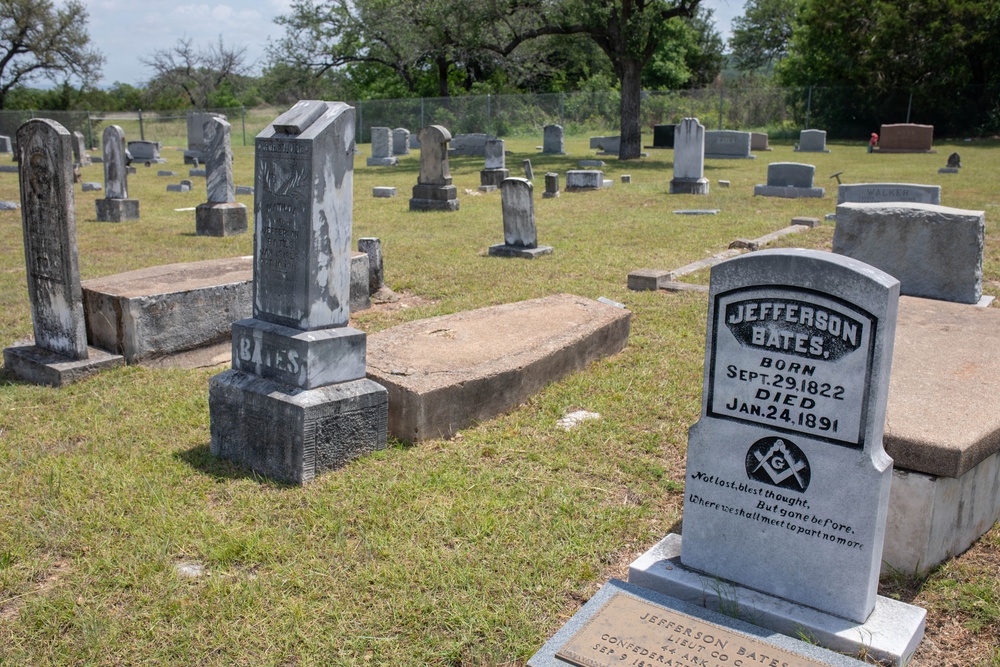 Cemeteries boast new flowers from visitors, descendants of families