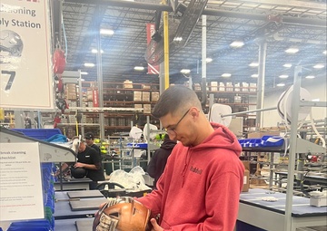 Future Sailor Supports Future Officers, Building Helmets for Army/Navy Game