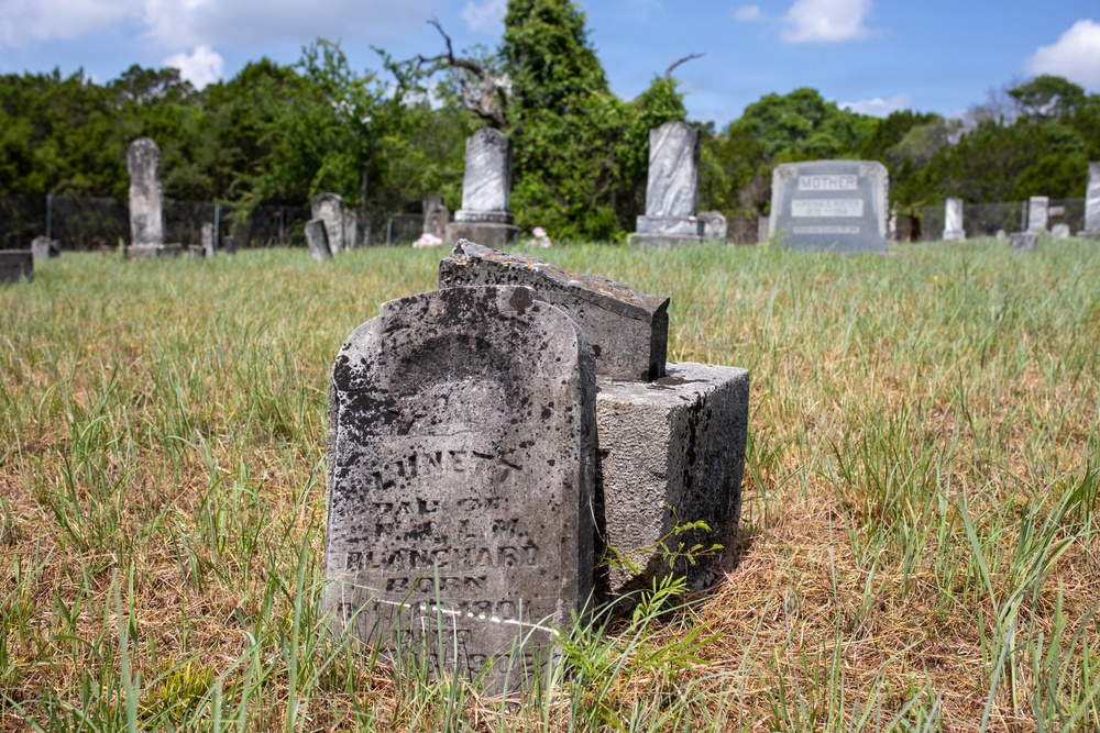 Cemeteries boast new flowers from visitors, descendants of families