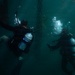 U.S. Coast Guard divers conduct aids to navigation operations