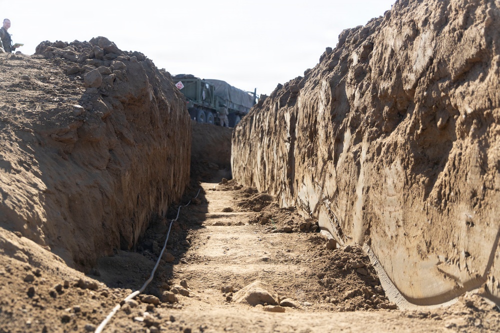 Digging In: 1st MLG Marines establish trench and bunker system